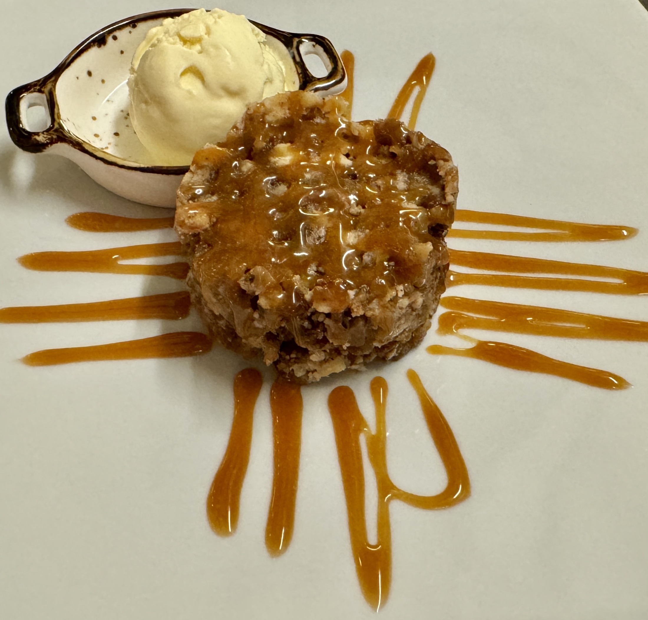 Warm dessert with ice cream and caramel