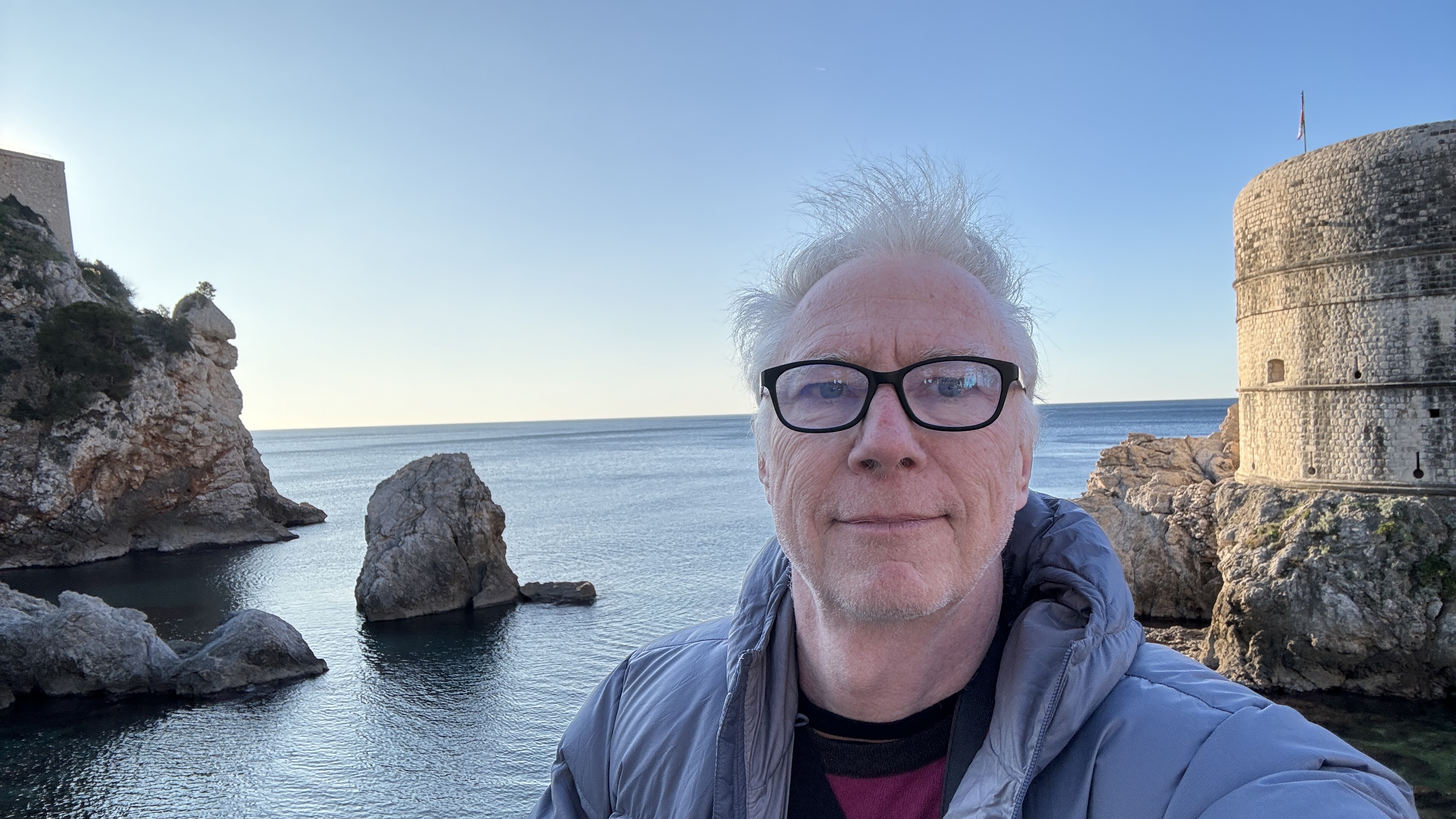 Dr John Walker travelling by the coast